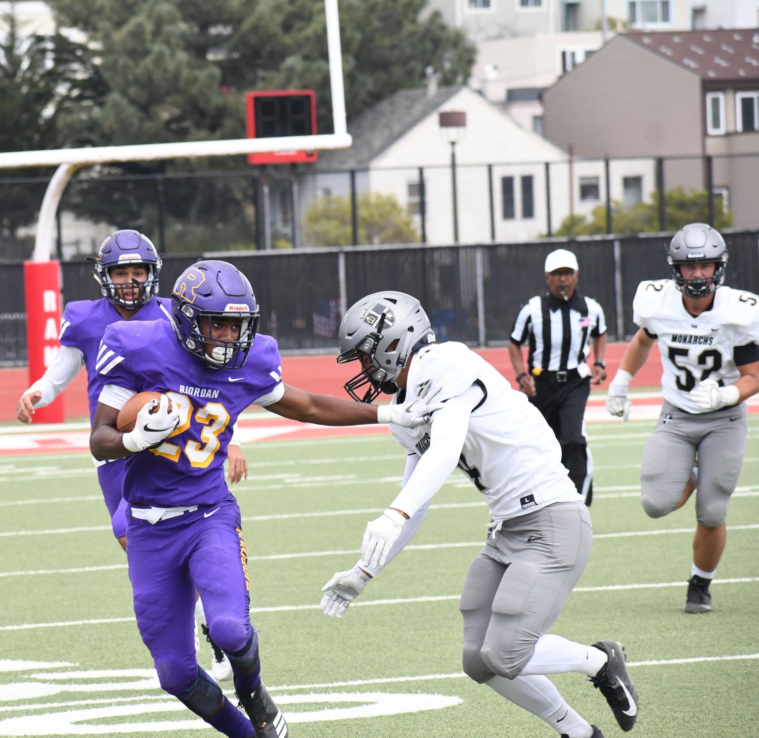 Jalen Camp ’20 pushes past a Mitty defensive player.