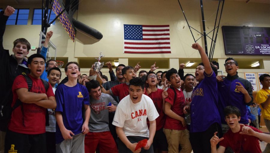 Members of Cana House celebrate a back to back Frosh Olympics win.