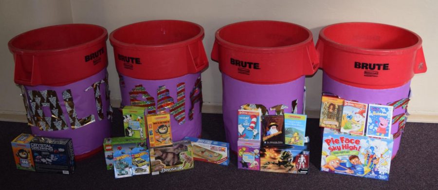 Bins for each House line the main office, ready to collect toys for children this Christmas.