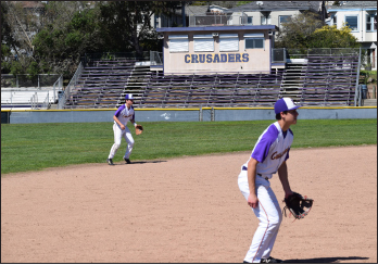 Will Miller ’20 and Jason Quinones ’19 are ready on defense. This is the last year the baseball team will play on a grass field at home. Thanks to many generous gifts and grants, construction on the new Mayer Family Field will begin after this baseball season ends.