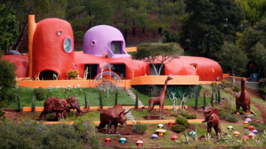 The back of the Flintstone House can be seen from Interstate 280.