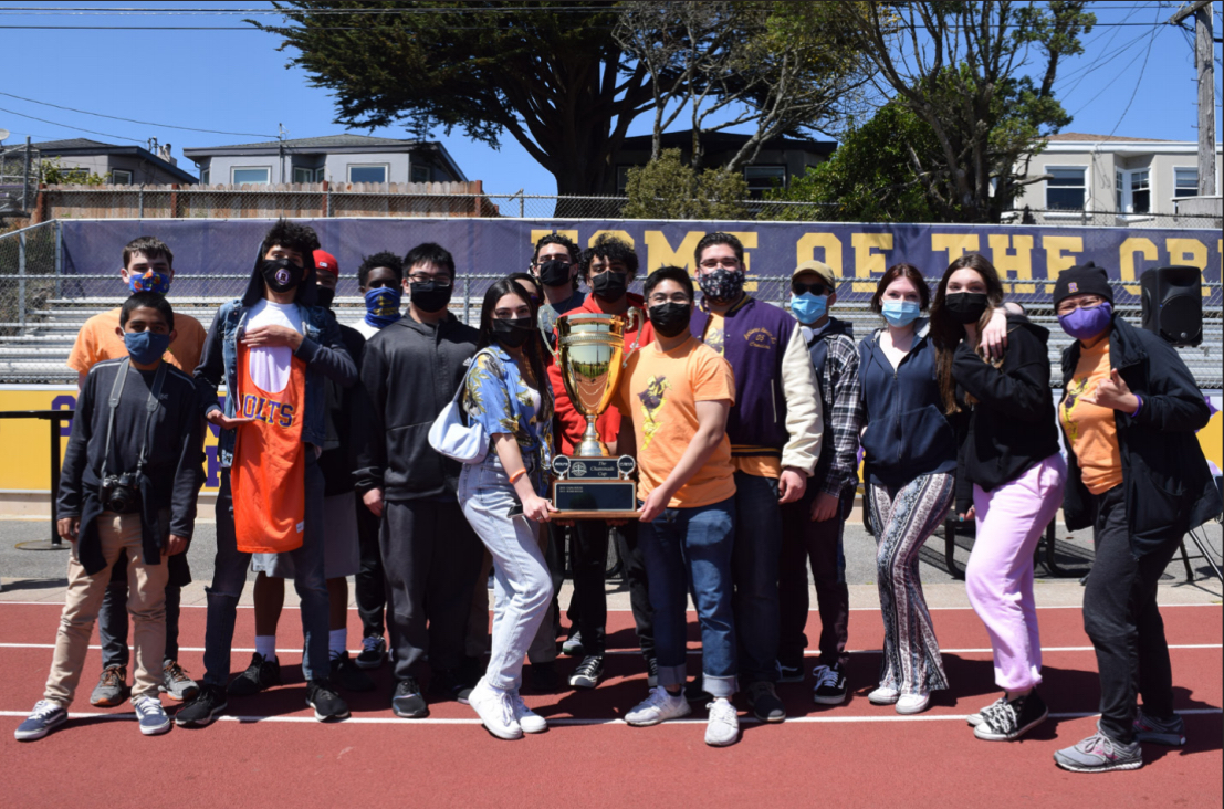 Members of the House of Bolts celebrate their repeat win of the Chaminade Cup at the Crusader Games BBQ.