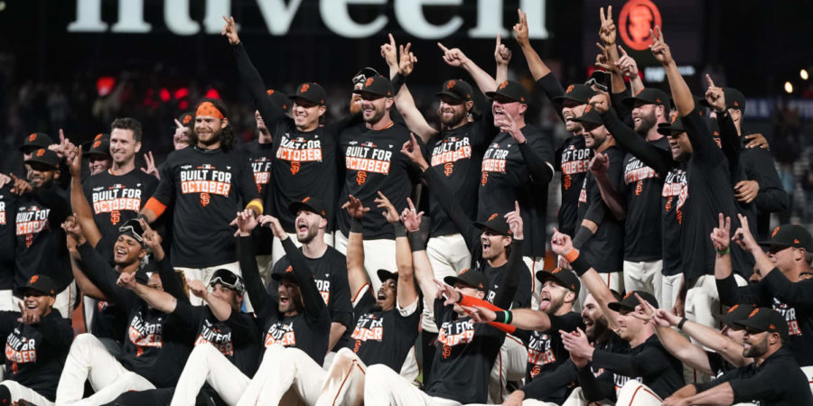 Members of the San Francisco Giants celebrate after clinching the division and advancing to the NLDS against their long-time rivals, the Los Angeles Dodgers.