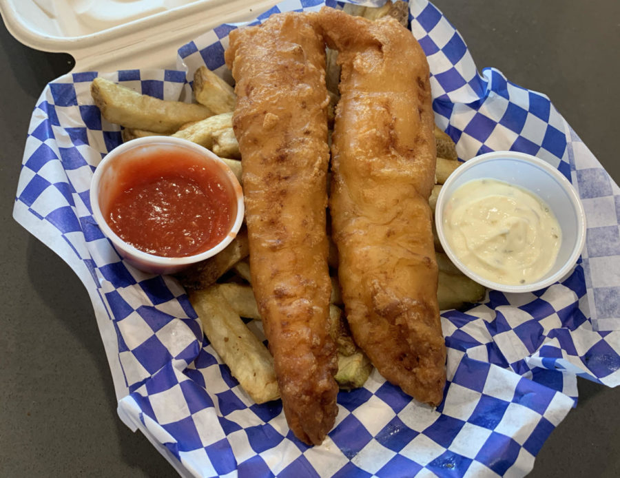 The Codmother Fish & Chips serves massive pieces of deep-fried cod on a bed of steak fries with two sauces.