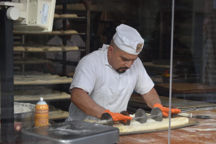 A baker at Boudin Bakery at Fishermans Wharf rolls out dough to create San Franciscos famous sourdough bread, which may be affected by climate change over the next few decades 