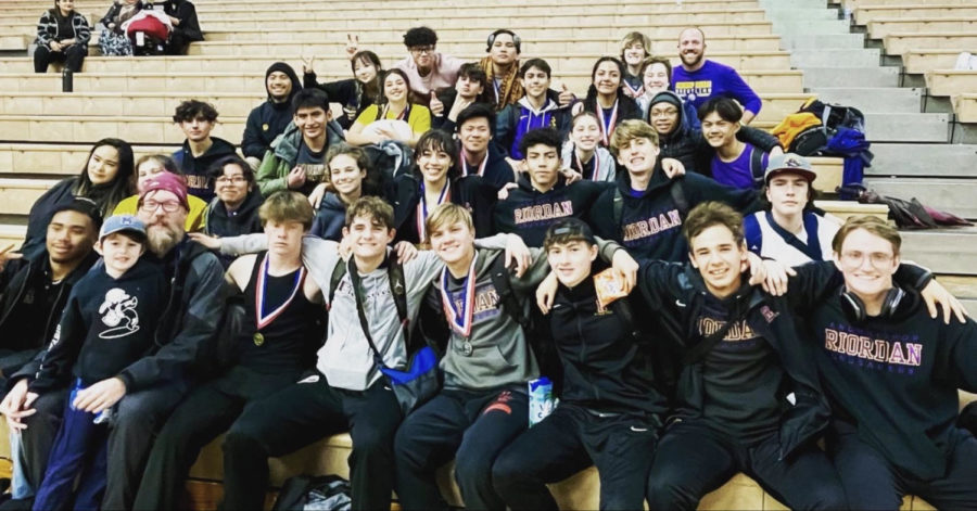 The Wrestling team gathered for a group photo after 17 Crusaders placed at the Colt Classic, and five emerged as tournament champions.