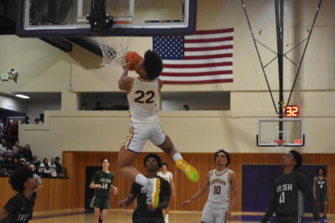 Christian Wise 23 leaps for the basket.
