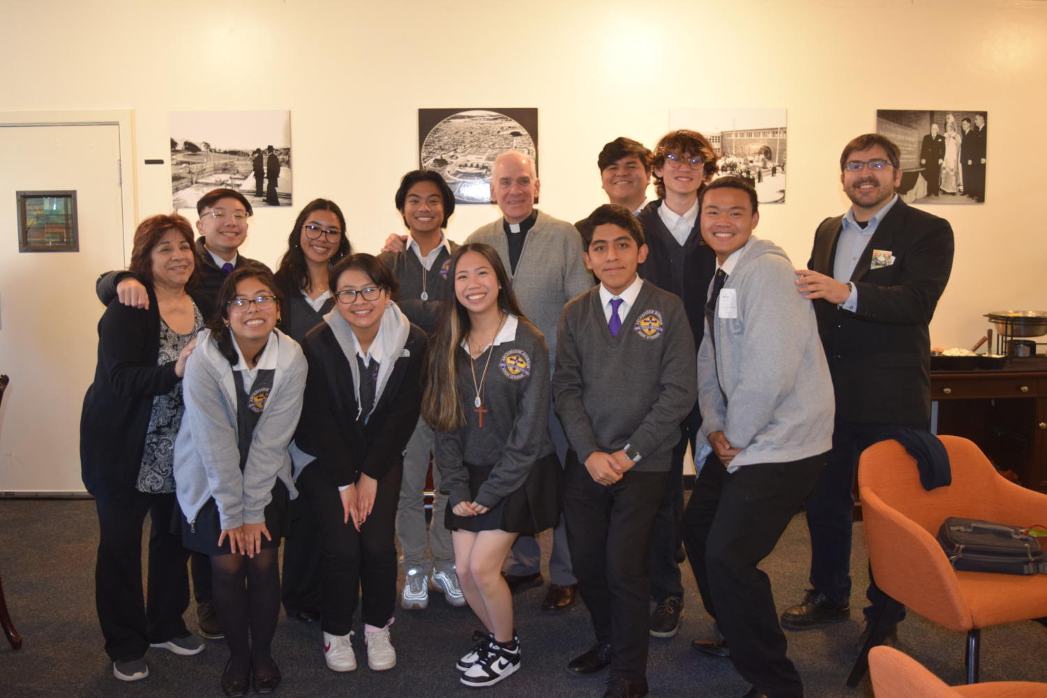 The LIFE team greets Fr. Marty Solma as he visits Riordan. 