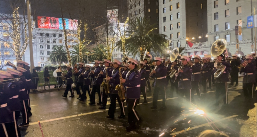 The Crusader Marching Band charges up Stockton Street during the parade. 