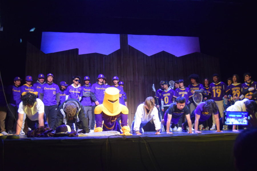 To finish the spring rally, representatives from each of their respective sports competed in a push-up contest.