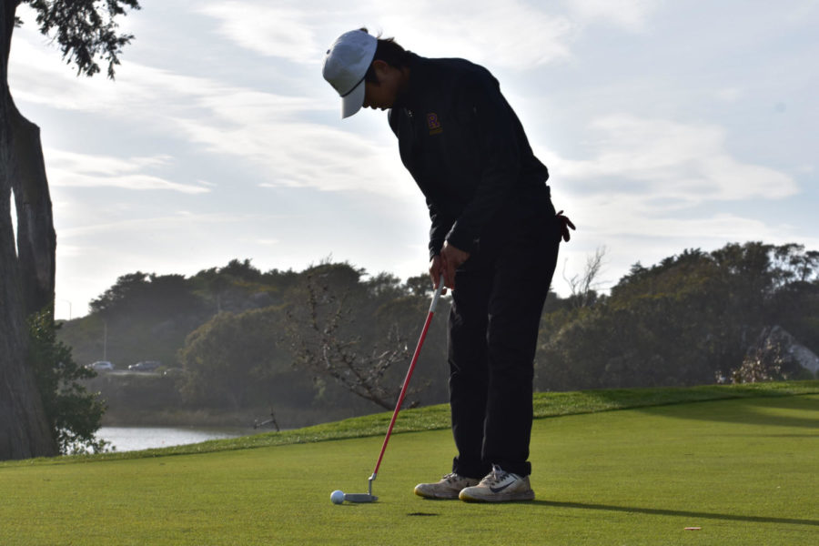 Alden Thai ’25 tees off during the game at Lake Merced’s Harding Park.