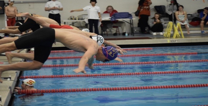 Peter Brown 25 dives into the water at a meet against SHC last month.