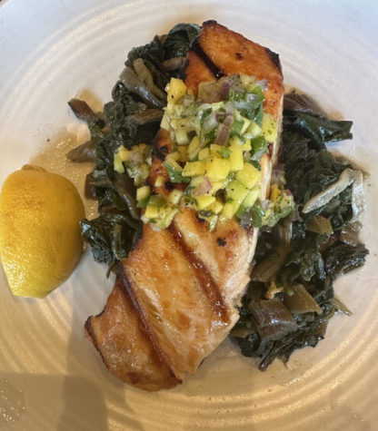 NOVY in Noe Valley serves grilled salmon with mango salsa and
horta, which is a delicious and unique twist on a classic seafood dish.