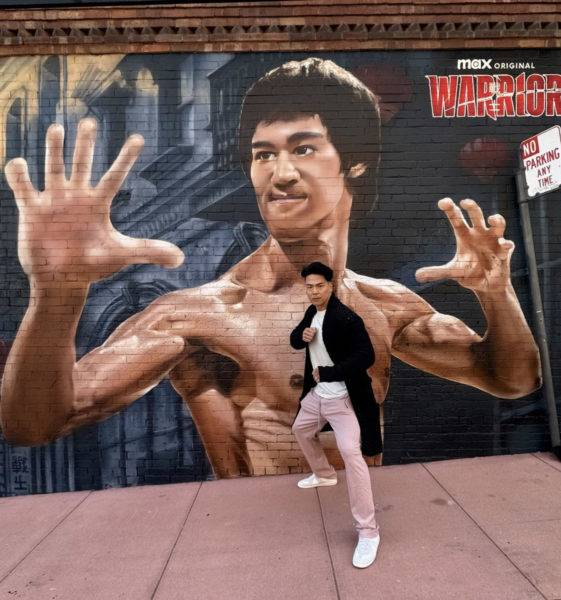 Actor Rich Ting 98 poses in front of the Bruce Lee Mural in Chinatown , celebrating the premiere of Season Three for HBOs series Warrior. 