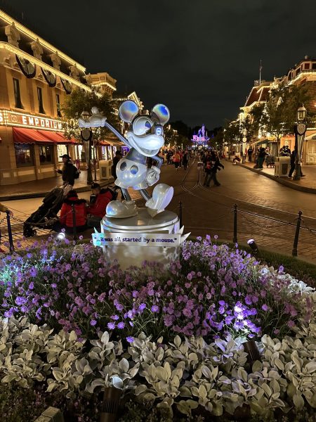 The platinum Mickey Mouse statue stands in the center of Main Street with the inscription quoting Walt Disney himself: “...it was all started by a mouse.”