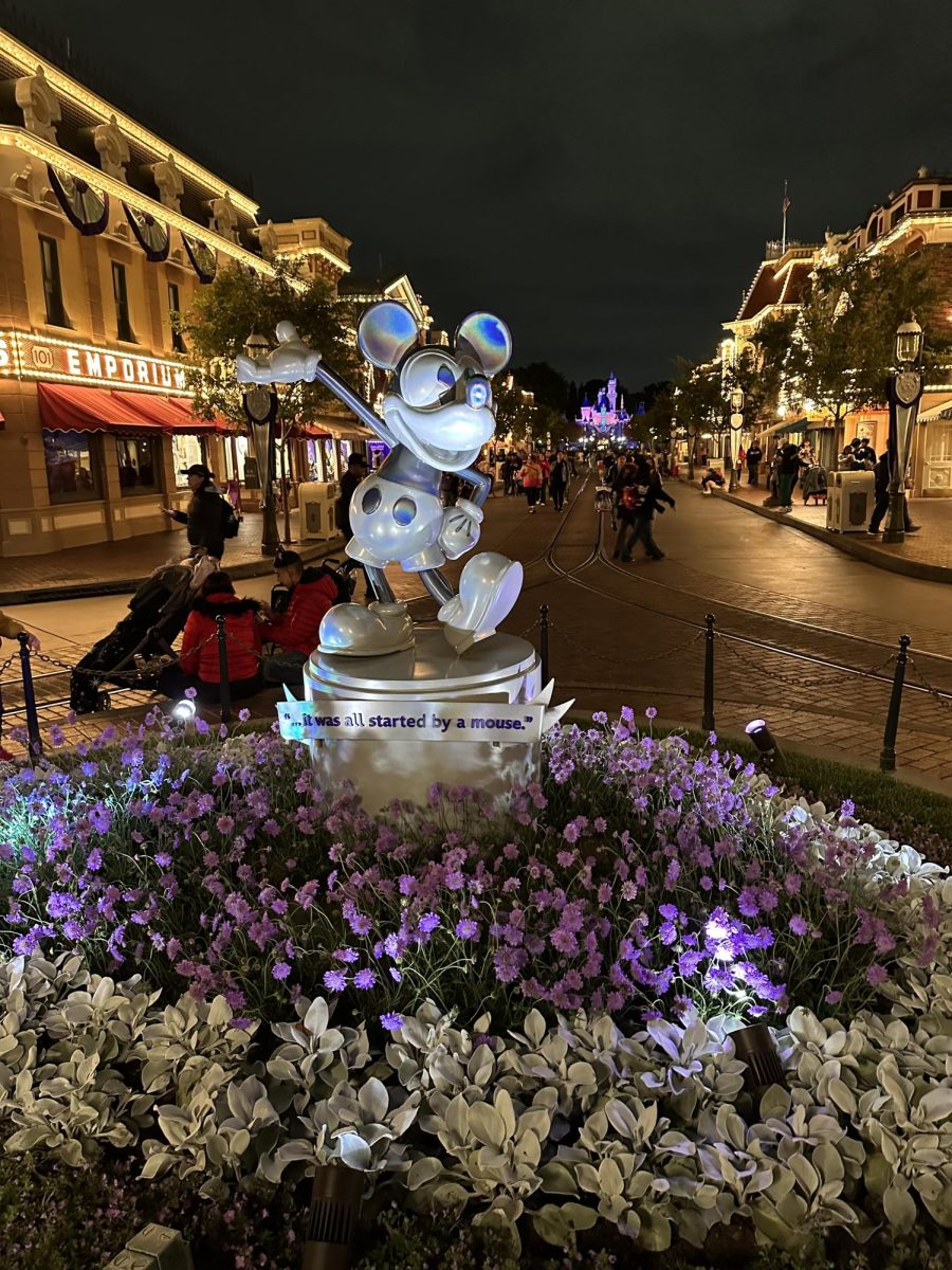 The platinum Mickey Mouse statue stands in the center of Main Street with the inscription quoting Walt Disney himself: “...it was all started by a mouse.”