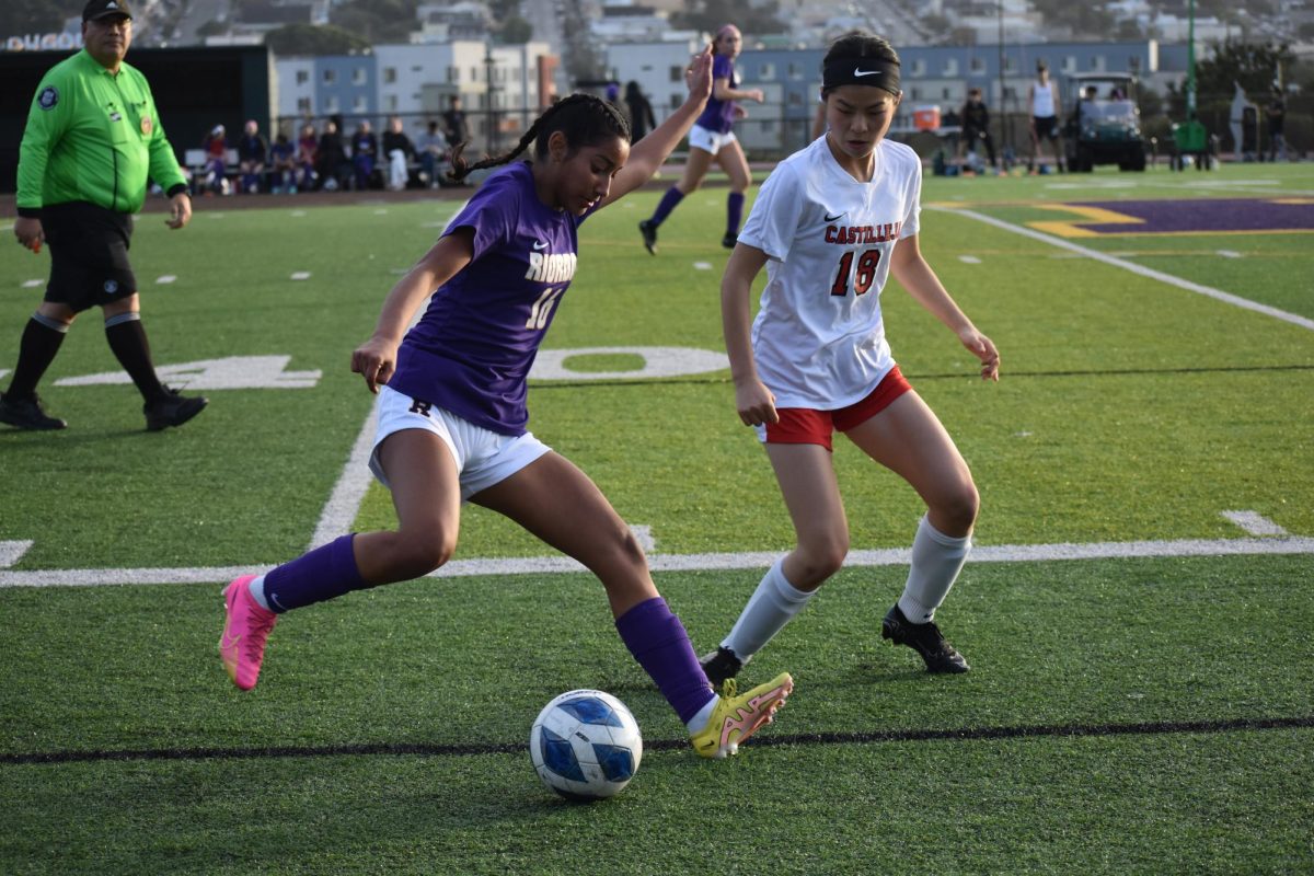 Cienna Lujano ’26 gets ready to pass the ball in a recent home game.