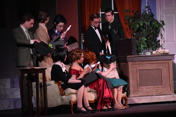 The characters in this year’s fall play, “Clue,” receive their murder weapons from their blackmailer in the dramatic climax of the classic “whodunit?” play.