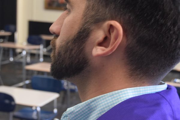 Religious Studies teacher Joshua Keeney displays his well-groomed facial hair. 