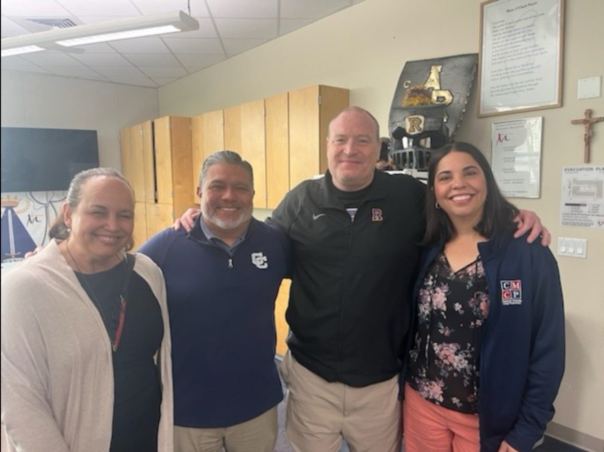 Vice Principal of Student Affairs, Brian Kelly with visiting Marianist team Raiza Echemendia, Kiana Cornell, and Lee Hernandez.