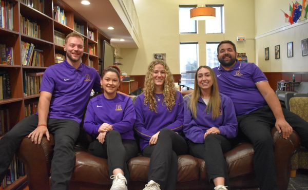 Room Assistants Michael Curtin, Kelsey Cottrell, Trinity Yates, Lauren Smith, and Scott Chiesa in the Rec Room.