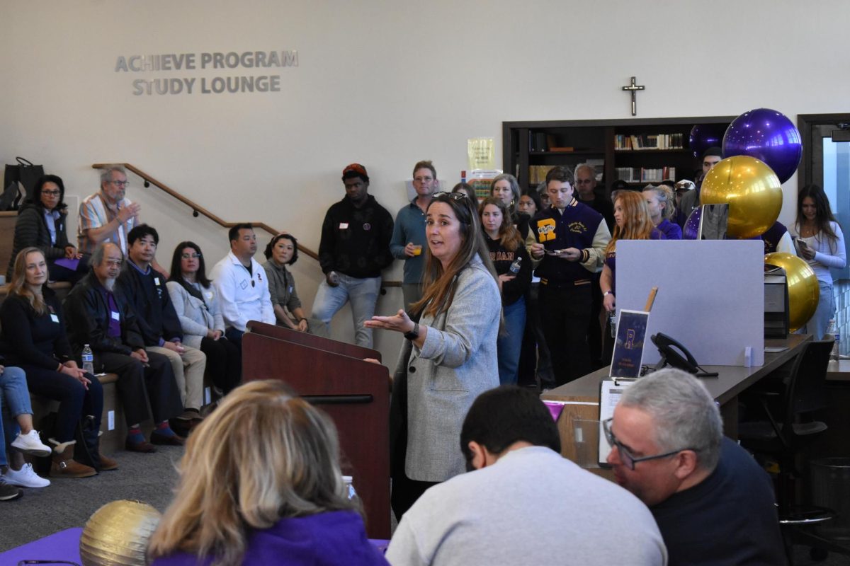 Stephanie Lundin, Director of RSP, speaks to current and past parents and
students in the library at the 30th anniversary celebration of the program.