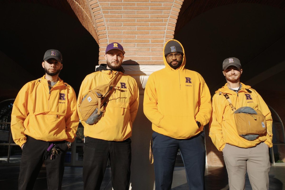 Safety team members, (from left to right) Alfonso Miranda ’17, Aidan Murphy ’14, LeVander Brown, and Michael Kilgariff ’17 keep students safe all day.