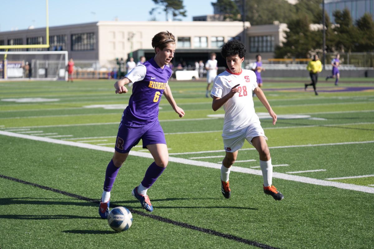 Braxton Nemes ’26 battles an SI player at a home game on Mayer Field.