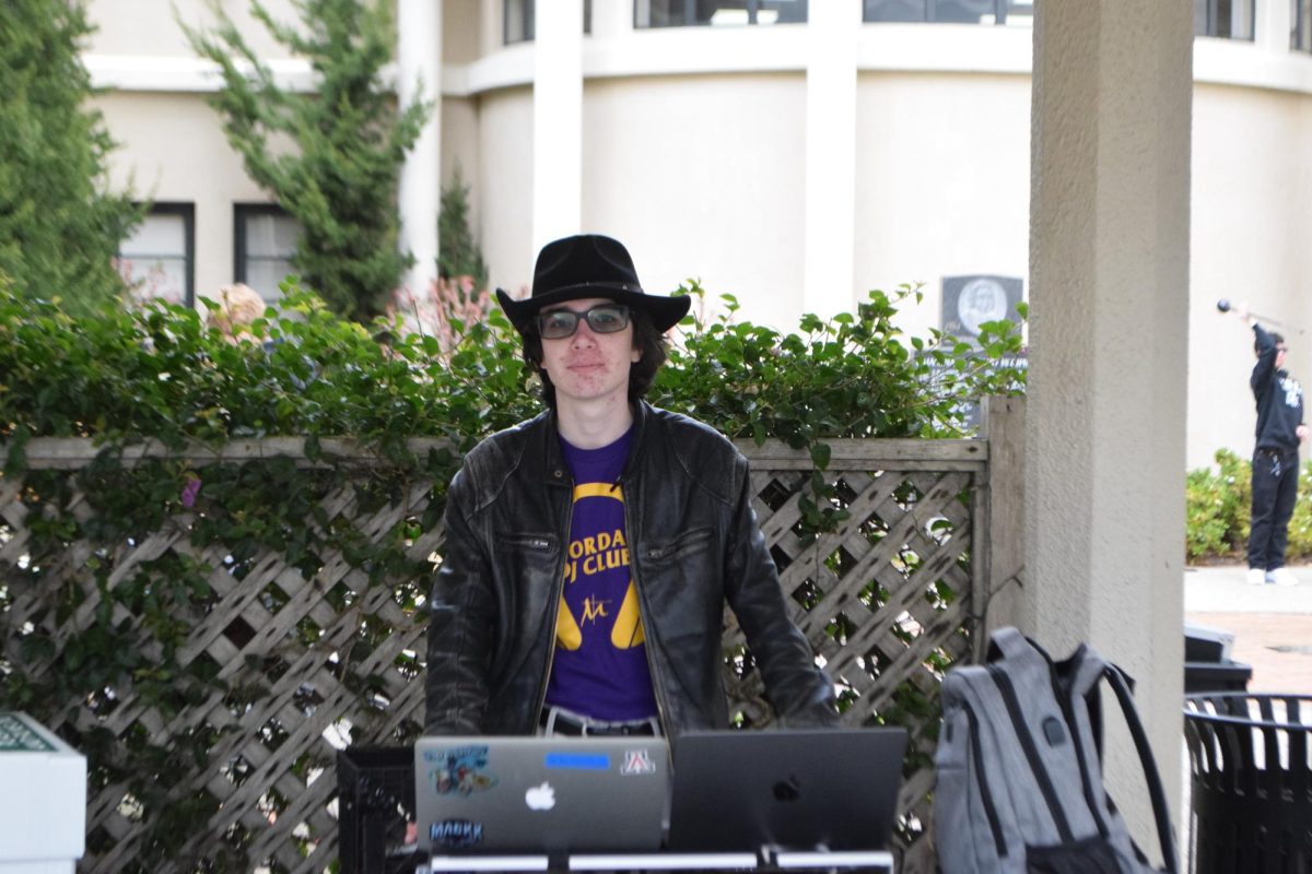 DJ Lō DJing in the courtyard, with (not pictured) other members of DJ Club.