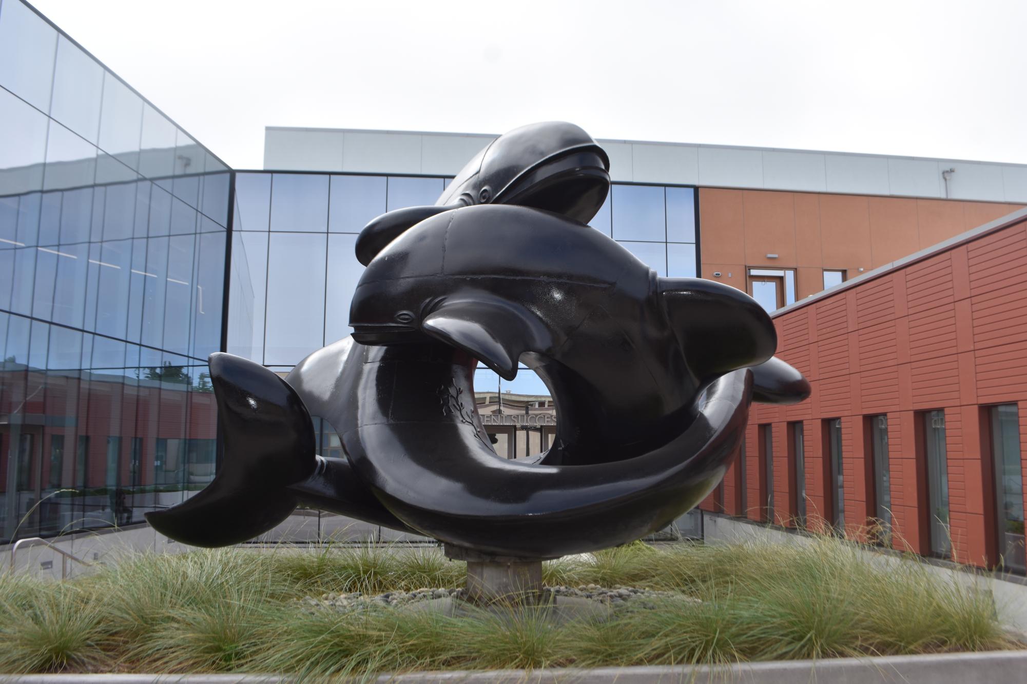 The Whales statue in its new home near CCSF’s Student Success Center.