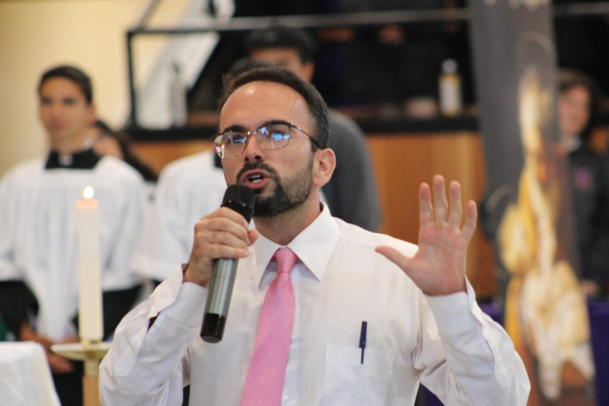 Nicholas Pellegrino spoke after a Mass on Oct. 8 about the sanctity of Holy Communion and the power of God's healing power. 