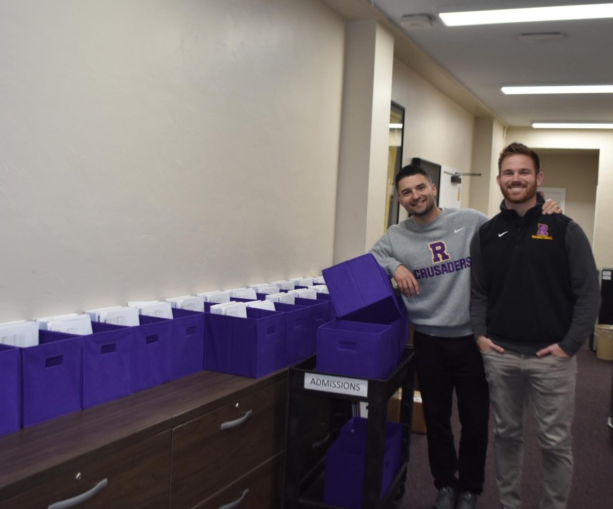 Archbishop Riordan High School is the fastest growing Catholic school over
five years in the United States. Here, Vice President of Strategy and Enrollment Danny Curtin ’08 and Admissions Associate Joe Kopp display the HSPT tests.