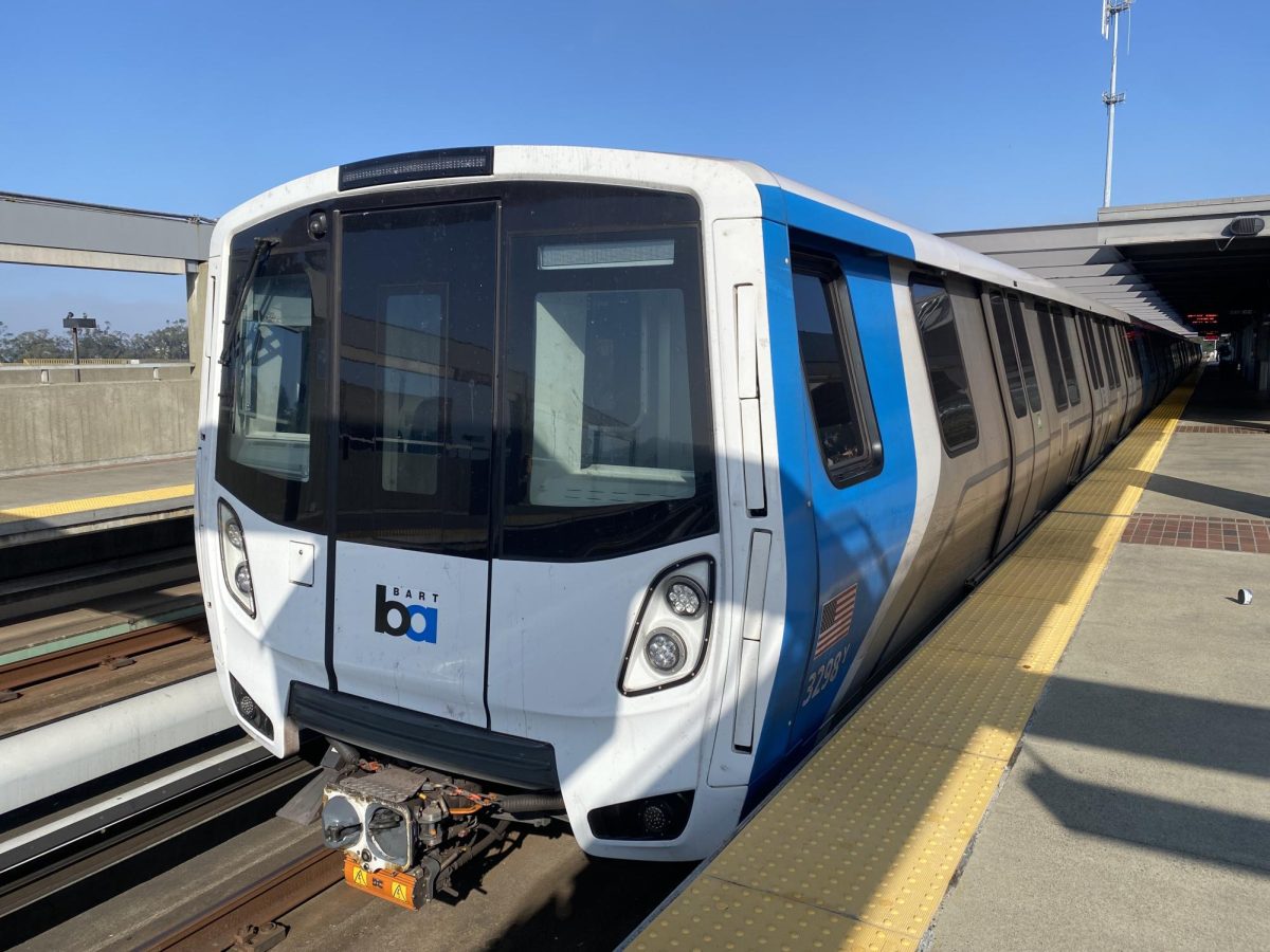 The blue line BART train pulls into the Daly City station at the end of its route.