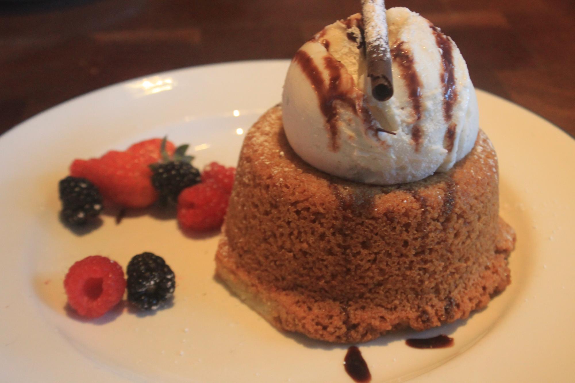 One of Joe's of Westlake's signature dishes is the warm butter cake topped with a scoop of vanilla ice cream, chocolate drizzle and mixed berries.