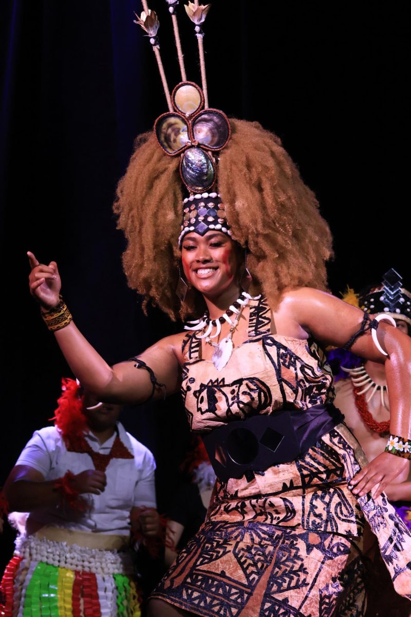 Pasifika Club dancer Pearl Winterstein '26 performs during Cultural Night, showcasing traditional movement and cultural pride through dance.