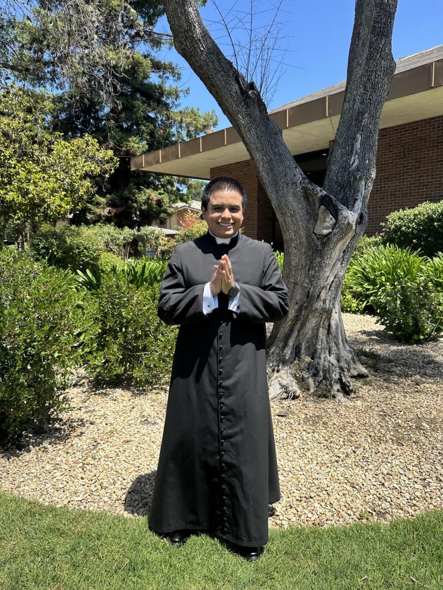 Jimmy Velasco ’17 stands in St. Patrick’s Seminary and University courtyard.