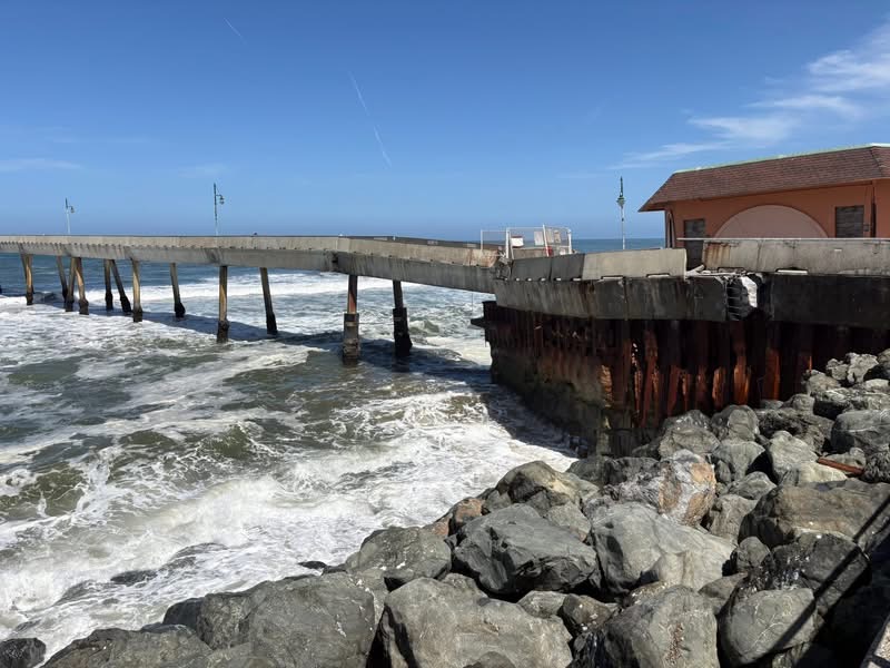 A large crack runs along the Pacifica Pier, one of the structural issues which prompted city officials to declare an indefinite closure.