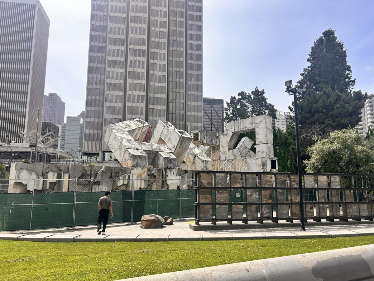 The Vaillancourt Fountain was surrounded by fencing before the demolition of the 54-year-old sculpture commenced. 